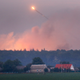 A possible stray rocket seen whirling above the depot. (Image: AP)